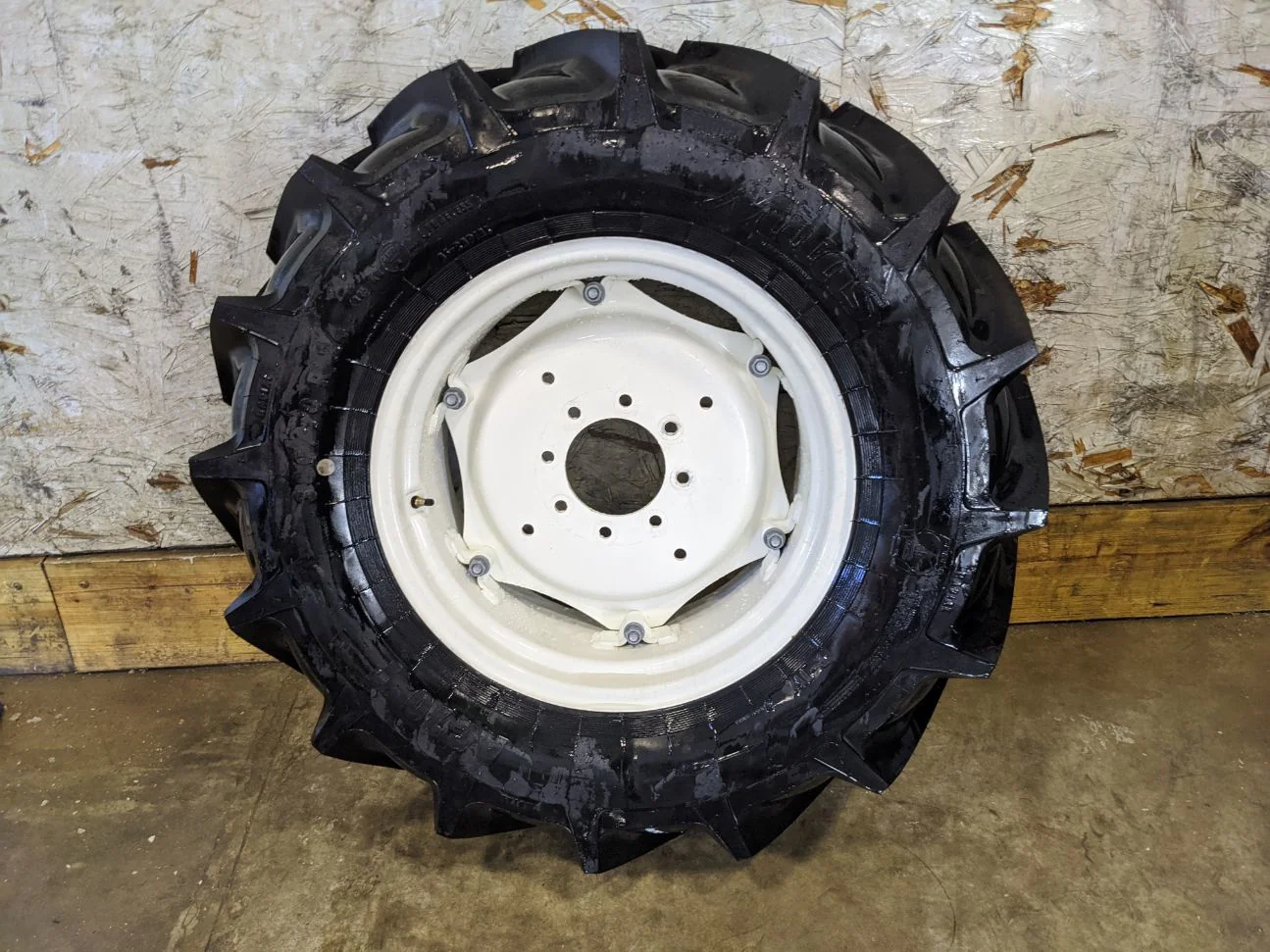 TAKE OFF 380/70R24 Mitas AC70 T 125A8 R-1W TL on a 11 x 24 NH GKN Style Wheel with a 8 Bolt Center.