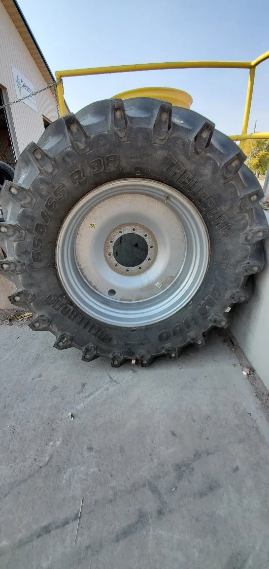 Take off 650/65R38 Trelleborg TM800 (166D) TL mount on 18 x 38 CIH Silver (10-13-11) Small Sidewall