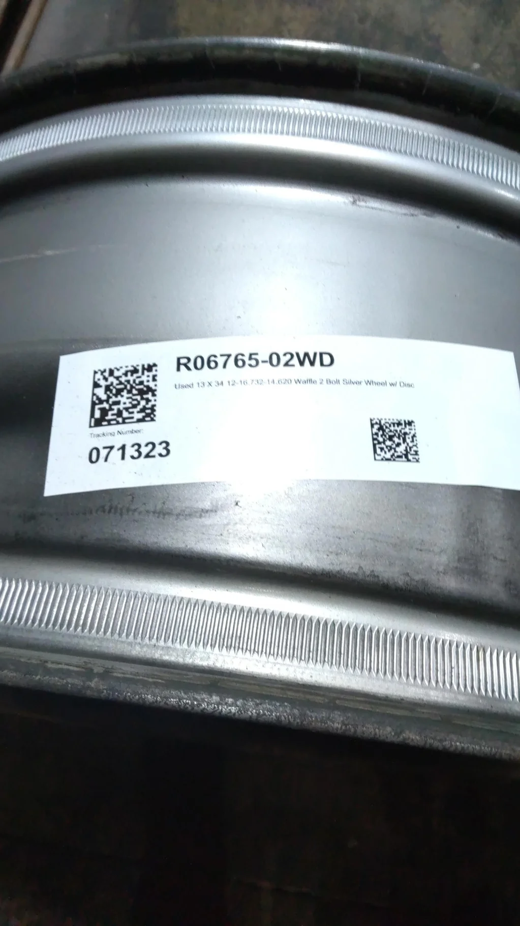 Used 13 X 34 12-16.732-14.620 Waffle 2 Bolt Silver Wheel w/ Disc image 3