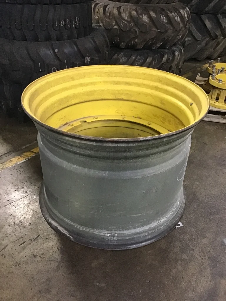 Used 27 X 38 12-32.047-30.078 Titan Rim & Rail Yellow Wheel