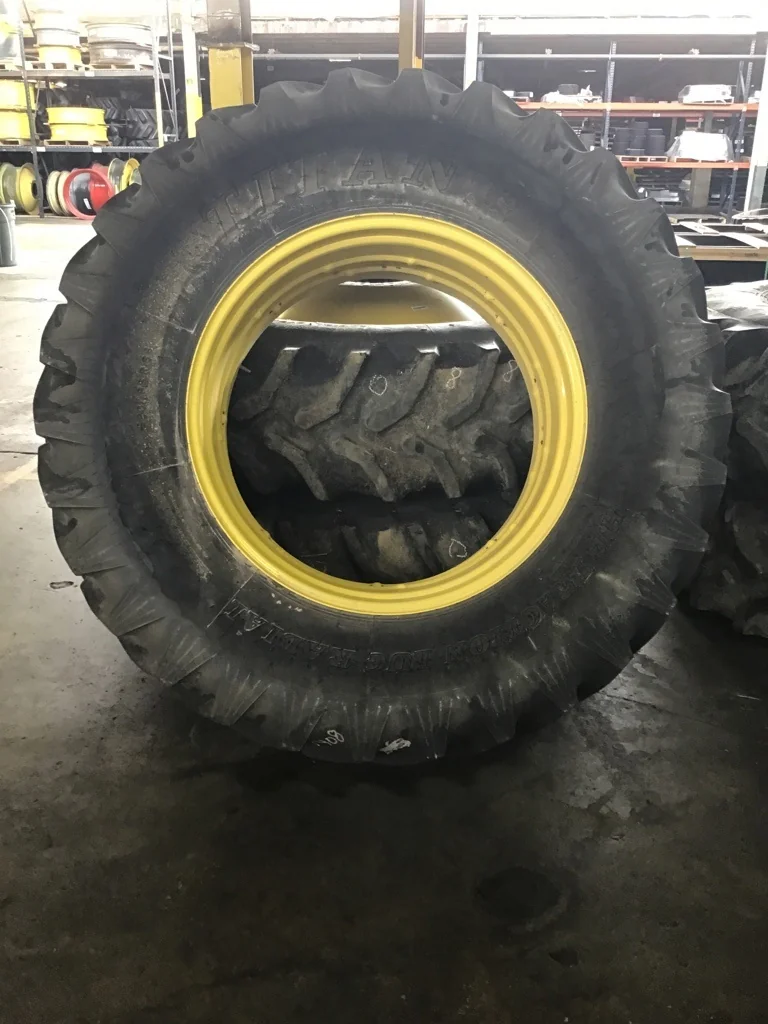 Used 520/85R38 148A8 Titan Hi-Traction Lug Radial TL R-1 85-90% on 18 X 38 Titan Double Bevel Yellow