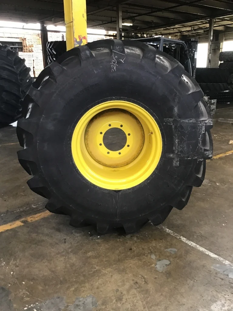 TAKE-OFF 750/65R26 169B FIRESTONE MAXI TRACTION TL R-1W 95-100% ON 25 X 26 8-10.82-8.78