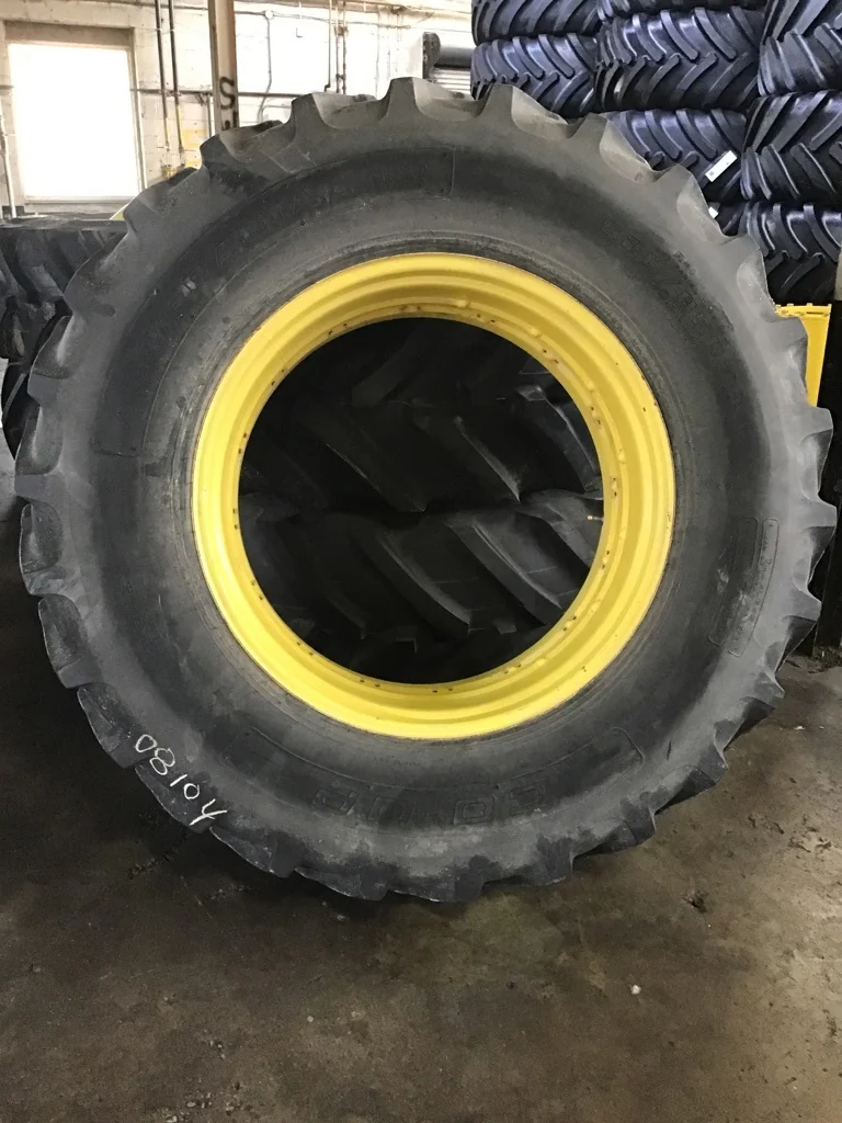 Used 520/85R38 155A8 CO-OP Agri-Radial IV TL R-1 85-90% on 18 X 38 Titan Double Bevel Yellow Wheel