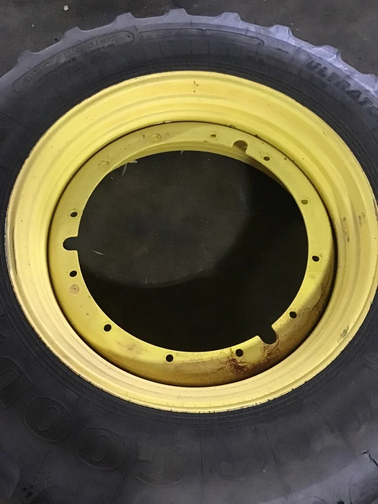 Used 16 X 42 12-32.047-30.078 Titan Rim & Rail Yellow Wheel