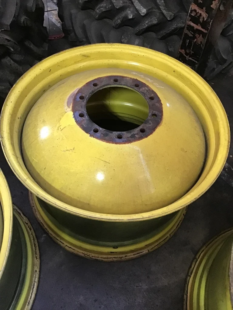 USED 23 X 38 10-13.187-11.09-14.37 (OUTSIDE) DOLLY DUAL YELLOW WHEEL