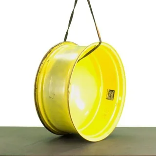 USED 16 X 38 10-13.187-11.07-12.4 (OUTSIDE) DOLLY DUAL YELLOW WHEEL