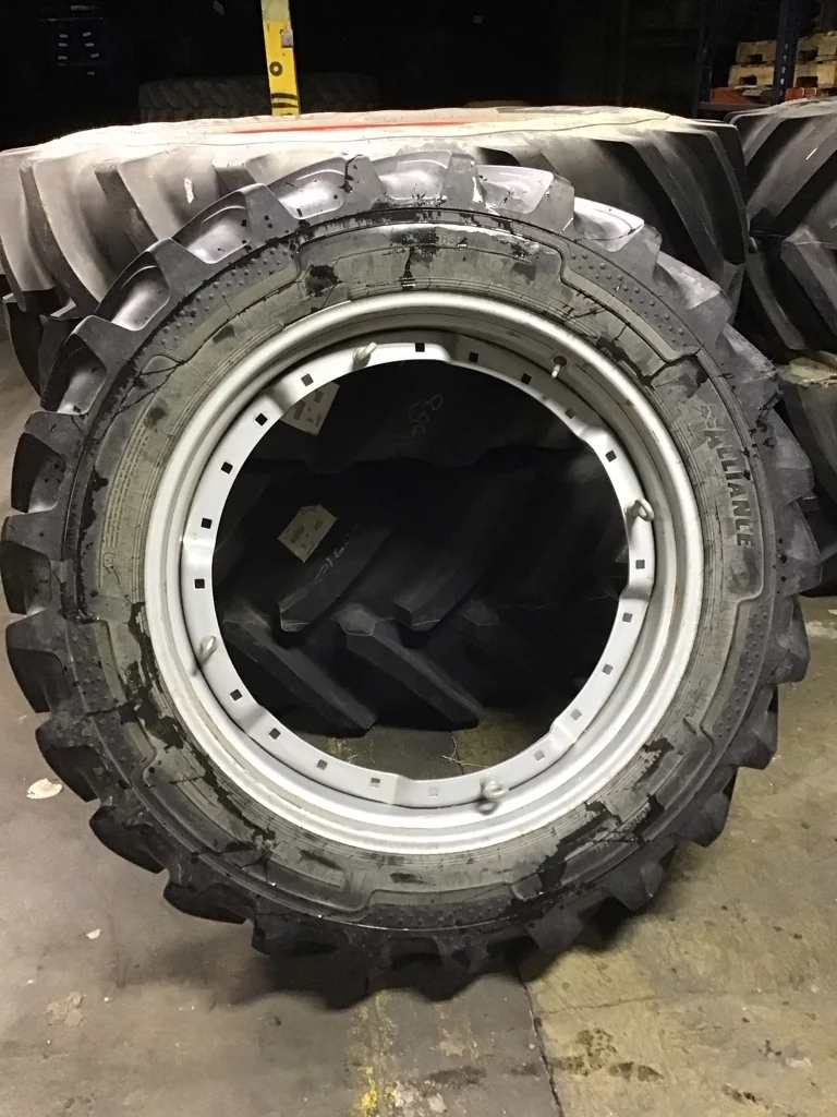 Used 340/85R38 151D Alliance Agristar II TL R-1W 80-85% on 12 x 38 24-33.25 3 Bolt Waffle Silver