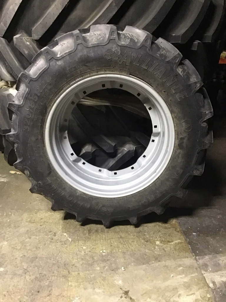 Used 320/85R28 124A8 Alliance Farm Pro II TL R-1W 85-90% on 10 x 28 16.23.25-21.6875 Waffle 2 Bolt