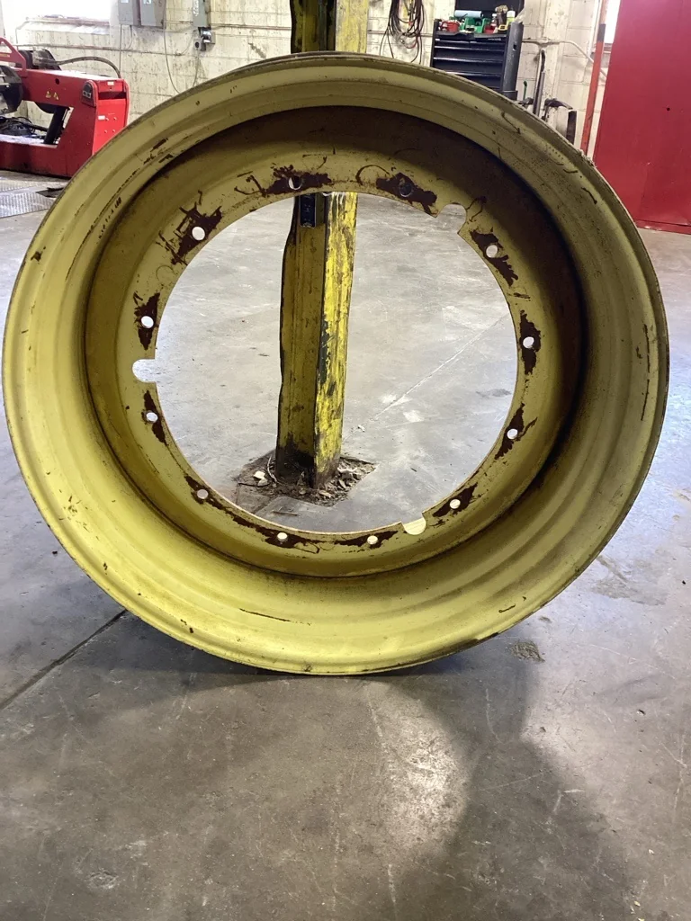 Used 20 x 46 12-32.047-30.078 Yellow Rim & Rail Wheel