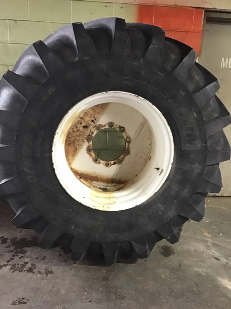 Used 800/65R32 172A8 Michelin Mega X Bib TL R-1W 60-65% on 27 x 32 10-13.19-11.07 Flat Plate White
