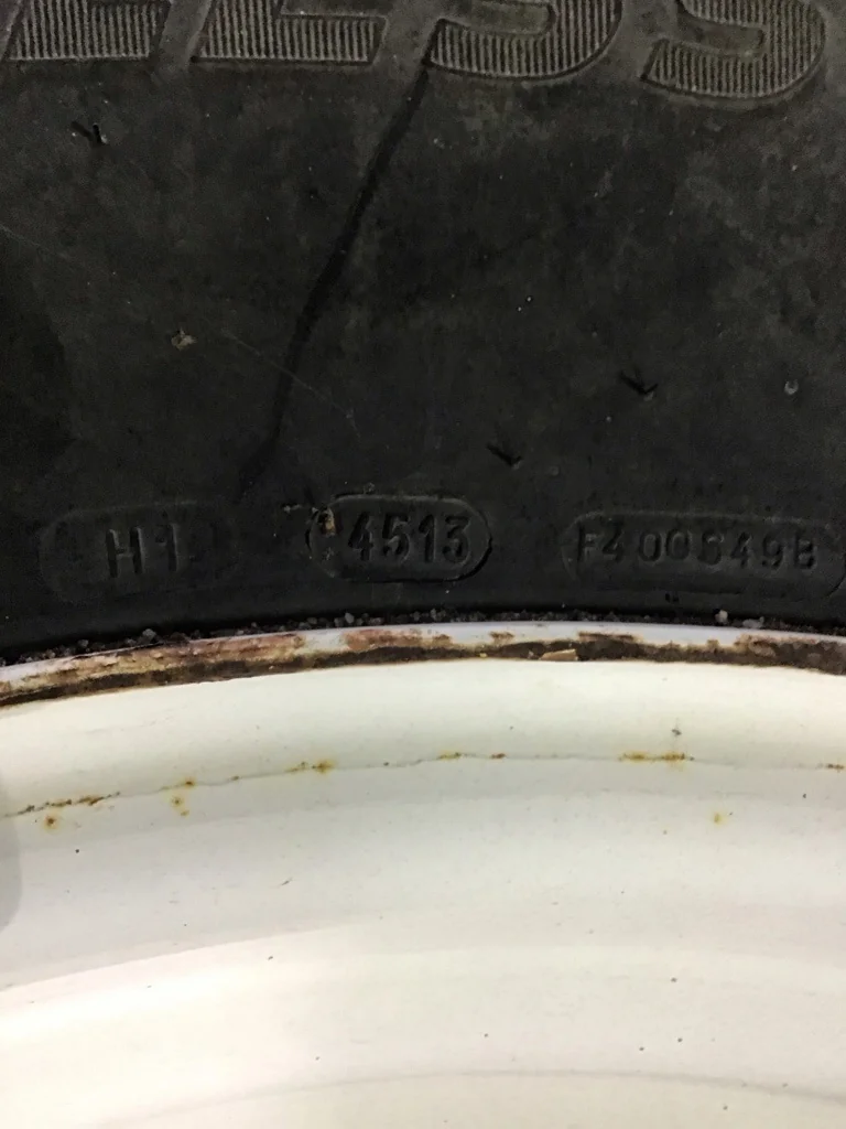 Used 800/65R32 172A8 Michelin Mega X Bib TL R-1W 60-65% on 27 x 32 10-13.19-11.07 Flat Plate White image 4