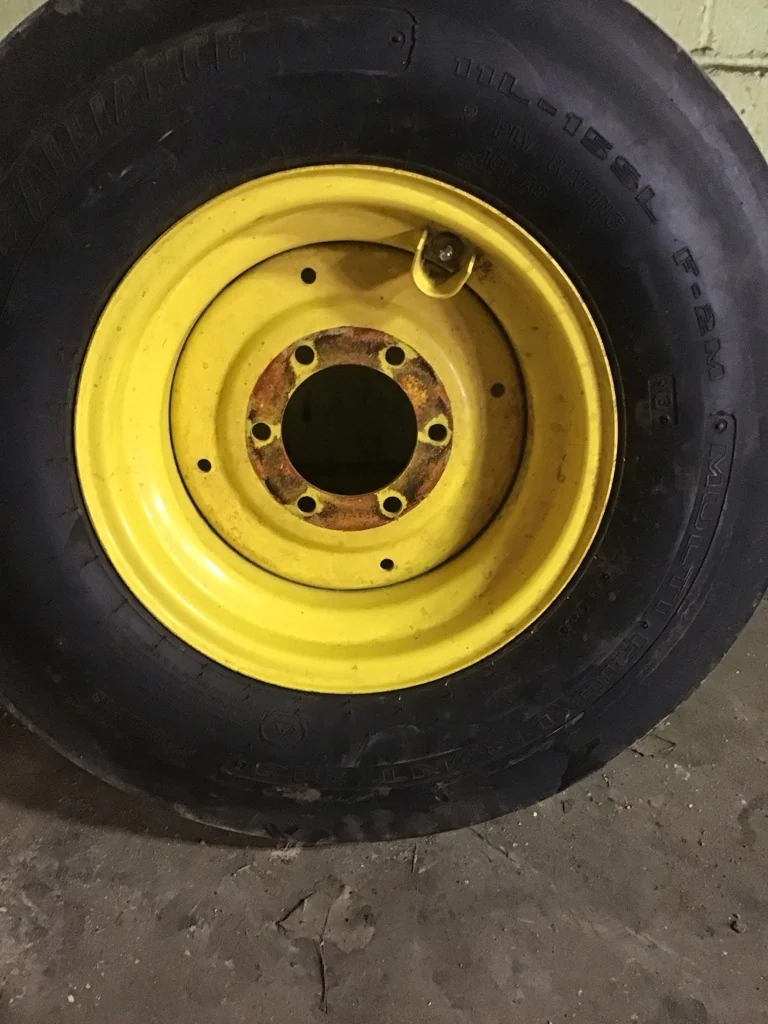 Used 11L-15/8 Alliance Multi Rib Front 313 TL F-2M 90-95% on 8 X 15 6-6-4.62 Solid Yellow Wheel image 4
