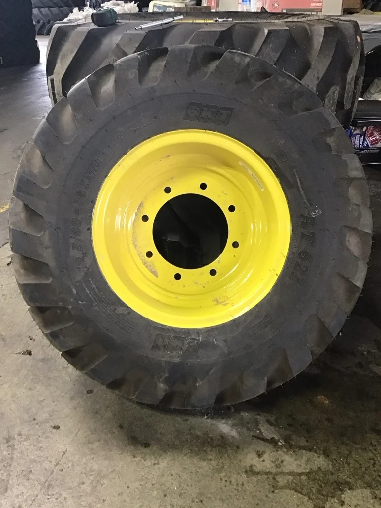 Take-Off 12.5/80-12 BKT AT621 TL R-4 95-100% on 9 X 18 8-10.82-8.78 GKN Solid Yellow Wheel(Assembly)