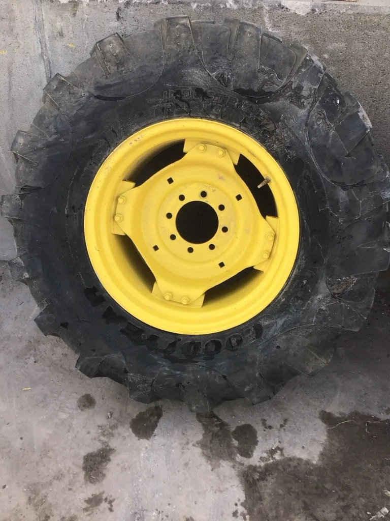 Used 16.9-24 8Ply Goodyear Industrial Tractor Lug TL R-4 90-95% On 15 x 24 (8-8-6) 4/2 Clamp/Disc