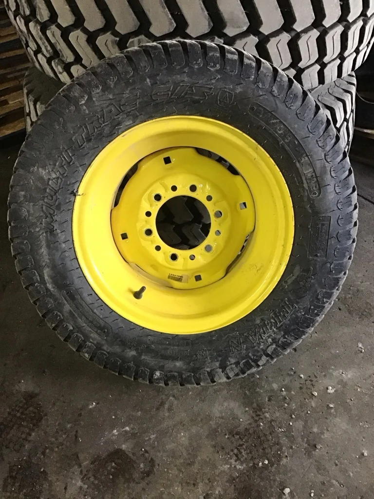 Take-Off 27x10.50-15 108B Titan Multi Trac C/S TL R-3 95-100% on 8 x 15 6-6-4.62 Implement Yellow