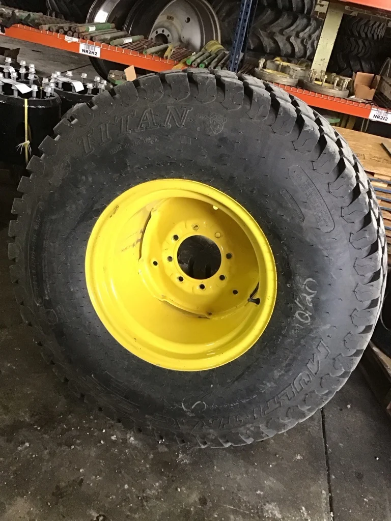 Take-Off 44x18.00-20 123B Titan Multi Trac C/S TL R-3 95-100% on 14 x 20 8-86 Solid Yellow Wheel on