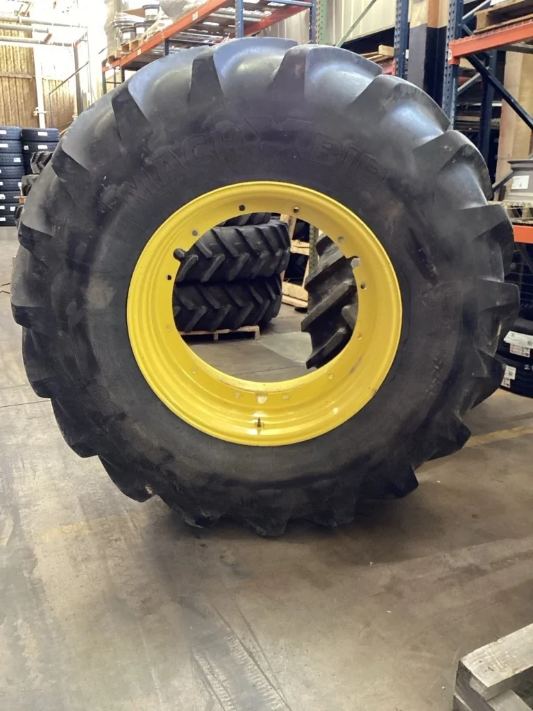 Used 710/70R38 171D Michelin MachXbib TL R-1W 90-95% On 23 x 38 12-32.047-30.078 R&R Yellow Wheel