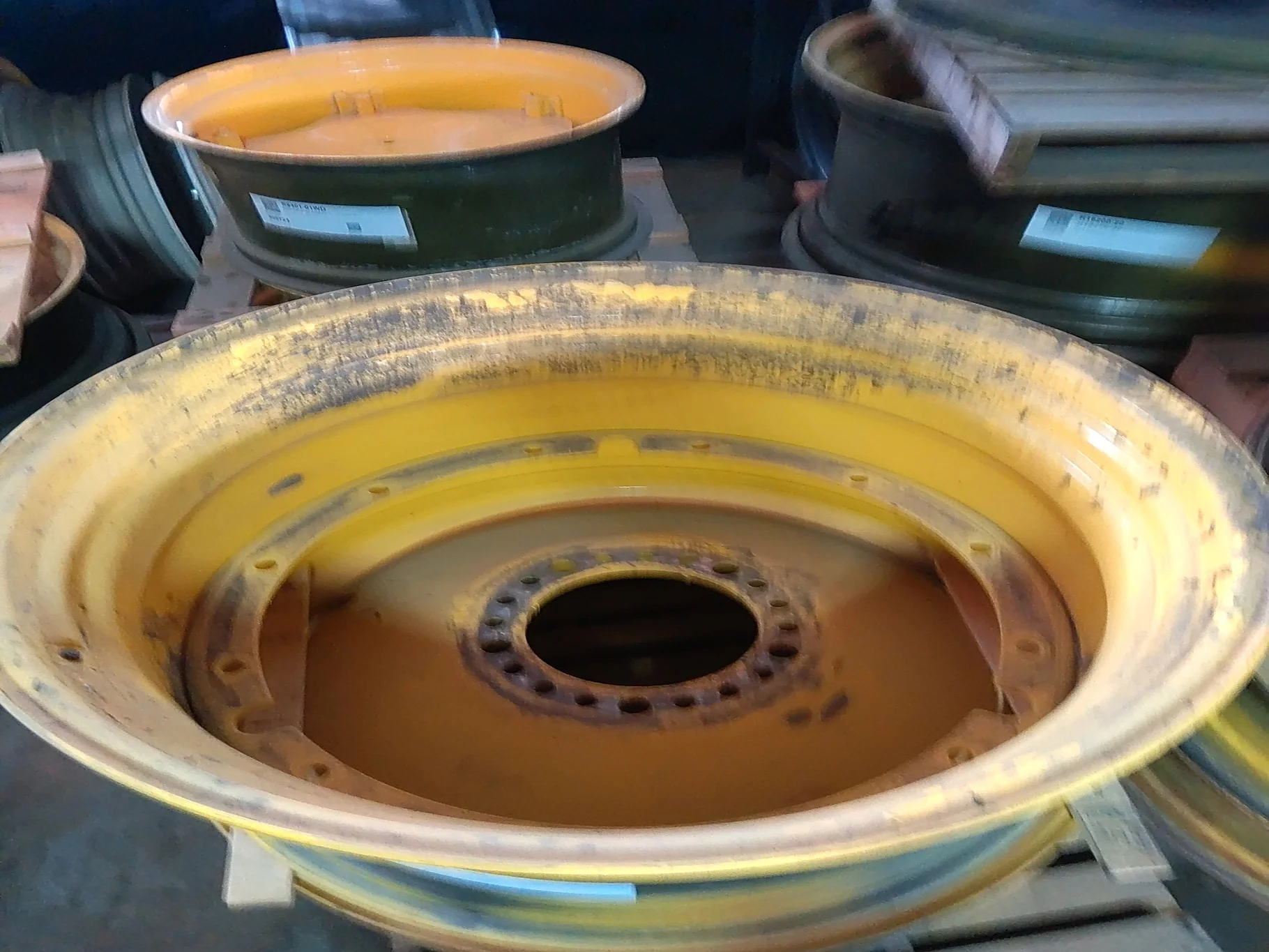 Used 23 x 38 12-32.047-30.078 Titan Rim & Rail Yellow Wheel