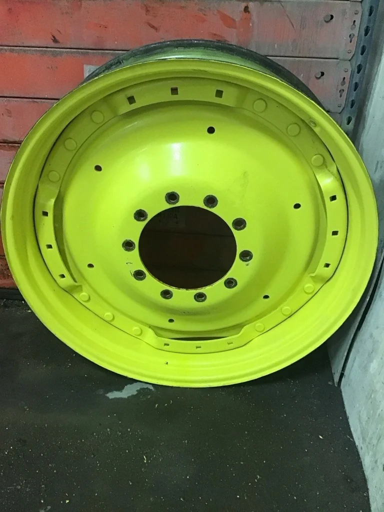 Used 12 x 38 Titan Waffle 3 Bolt With disc (10-13.19-11.07) JD Yellow (Rust,Some Fading, Gashes)