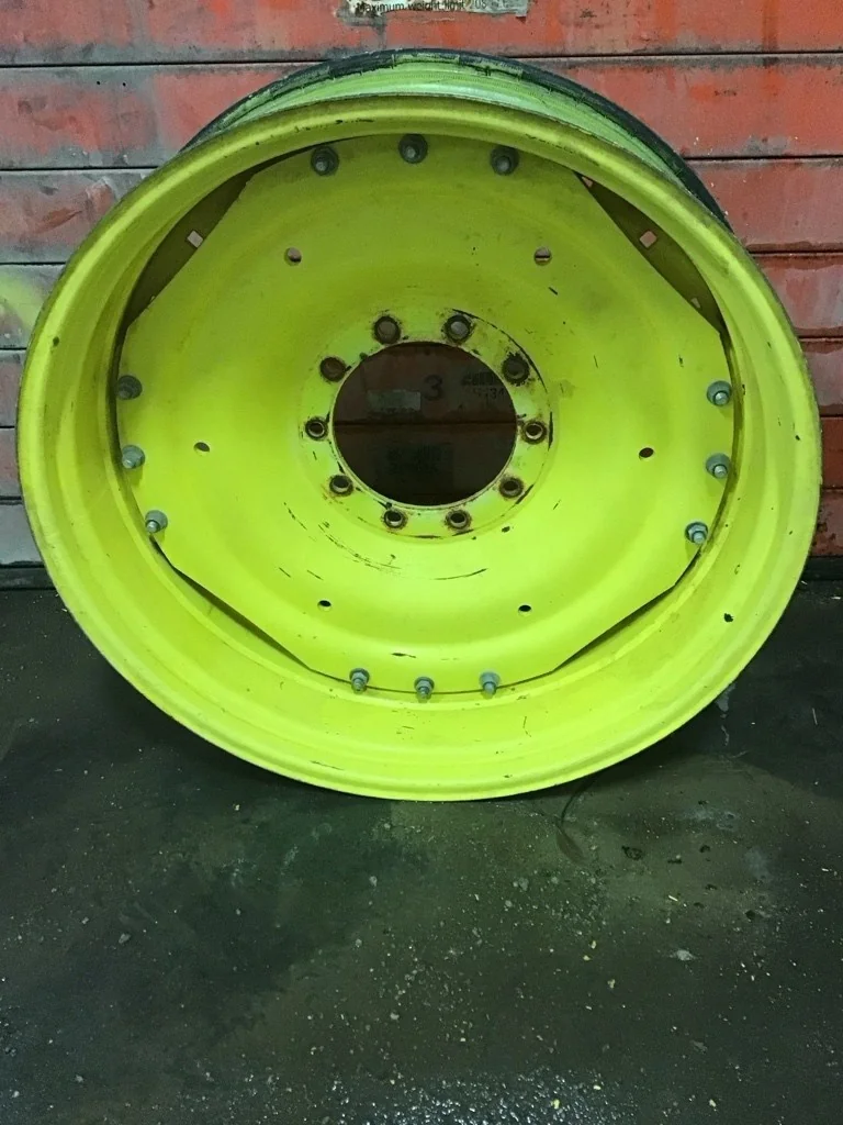 Used 12 x 38 Titan Waffle 3 Bolt With disc (10-13.19-11.07) JD Yellow (Rust,Some Fading, Gashes) image 2