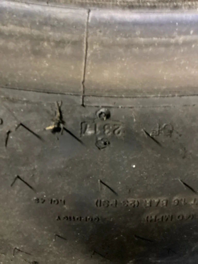 Used LSW 1100/35R32 175D Goodyear Optitrac TL R-1W 95-100% Mild Cuts, Weather checking image 3