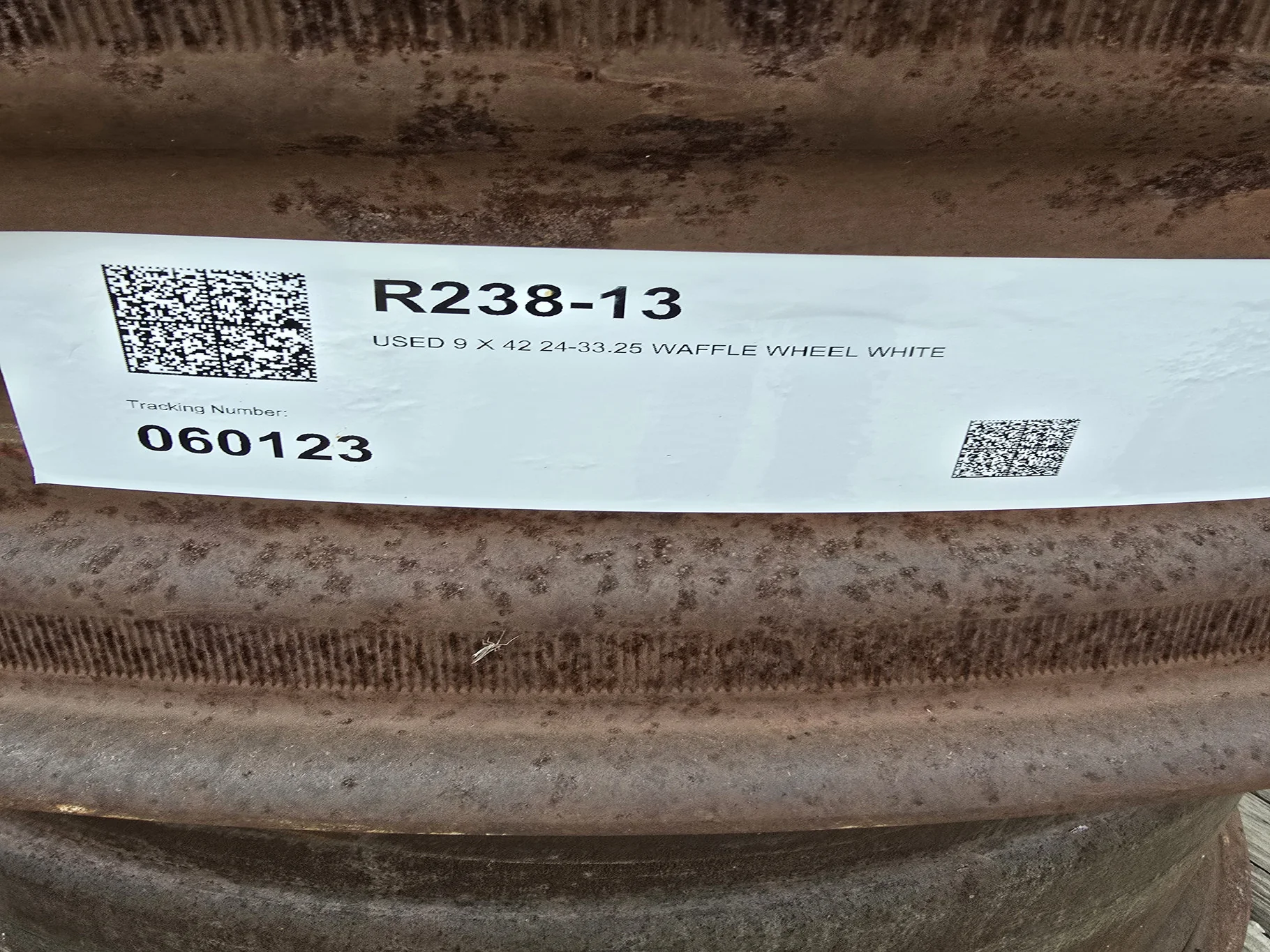 USED 9 X 42 24-33.25 WAFFLE WHEEL WHITE
