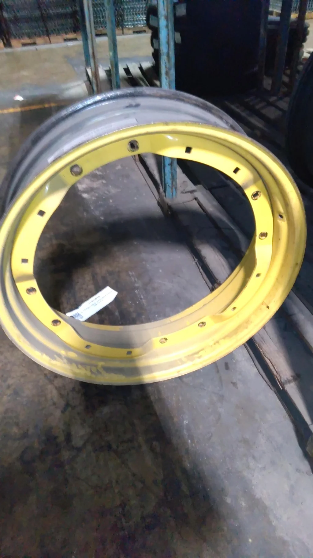 Used 10 X 34 12-16.732-14.620 2 Bolt Waffle Yellow Wheel