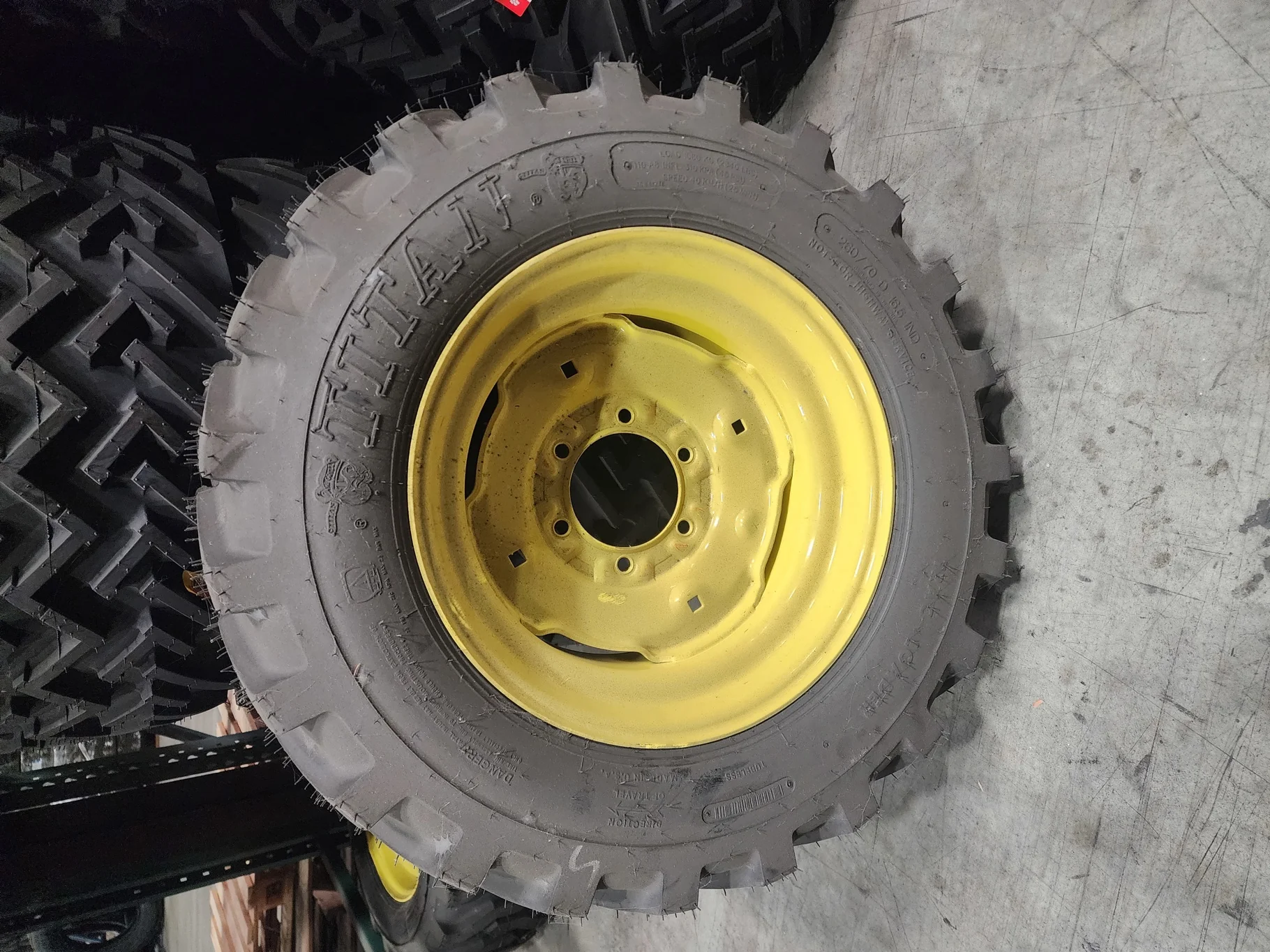 Take-Off 260/70-16.5 110A8 Titan Trac-Loader TL R-4 95-100% on 9 X 16.5 GKN 8-8-6 Solid Yellow Wheel
