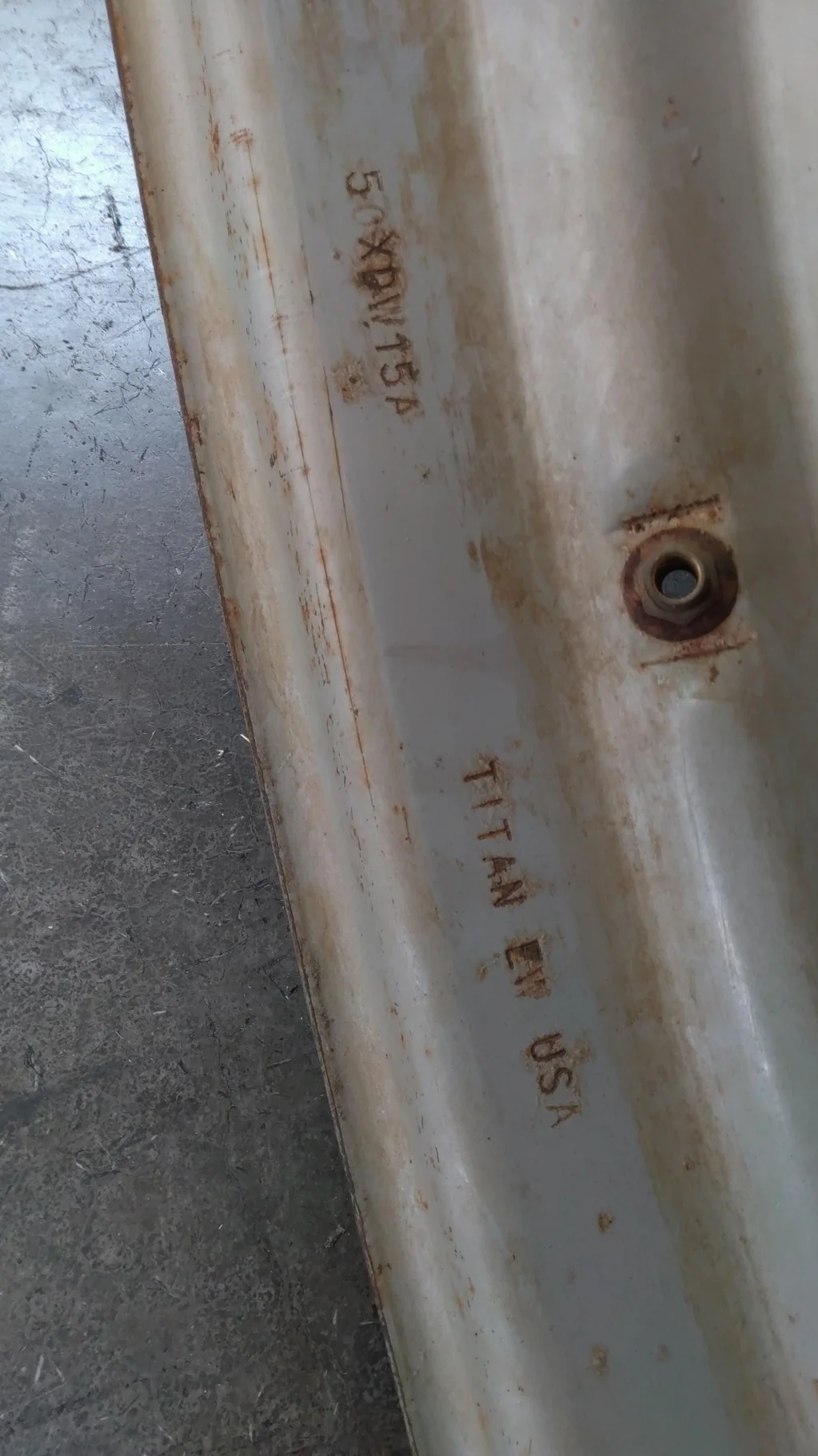 Used 15 X 50 12-30.375-28.440 Rim & Rail Silver Wheel