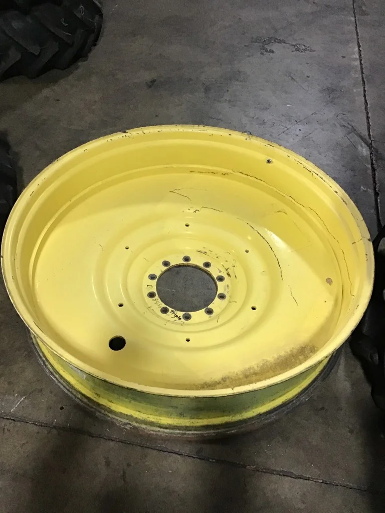 Used 12 X 54 10-13.18-11.09-8.63 Dual Yellow Wheel image 2