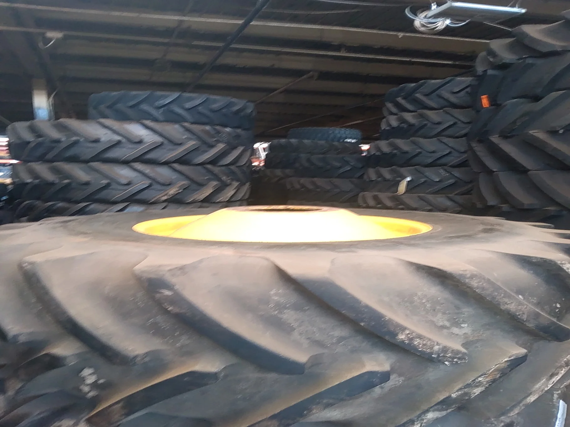 Used 650/85R38 173A8 Michelin MachXbib TL R-1W 90-95% on 23 X 38 10-13.19-11.07-14.37 Dolly Dual Yel