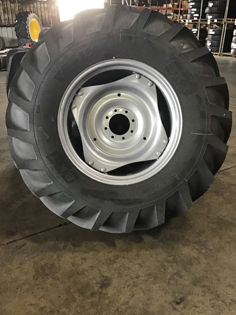 18.4R30 BKT TR136TT Tires 100% on 15 x 30 8-8-5.94 4/2 clamp silver w/ disc image 2