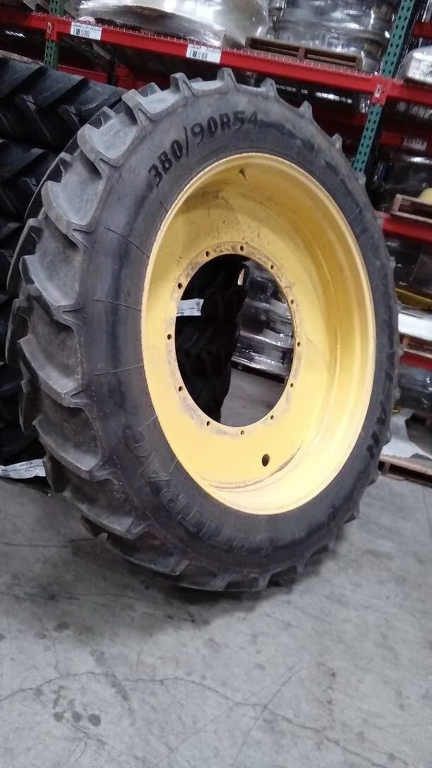 Used 380/90R54 152D Goodyear Optitrac TL R-1W 95-100% on 12 X 54 12-32.047-30.078 Rim & Rail Yellow