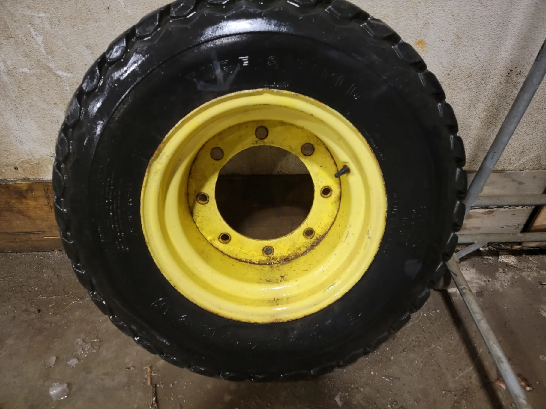 Used 50% 9.5-16 Firestone Turf and Field R-3 C(6Ply) TL on a 8 x 16 JD Yellow 8 Bolt (.812) Wh