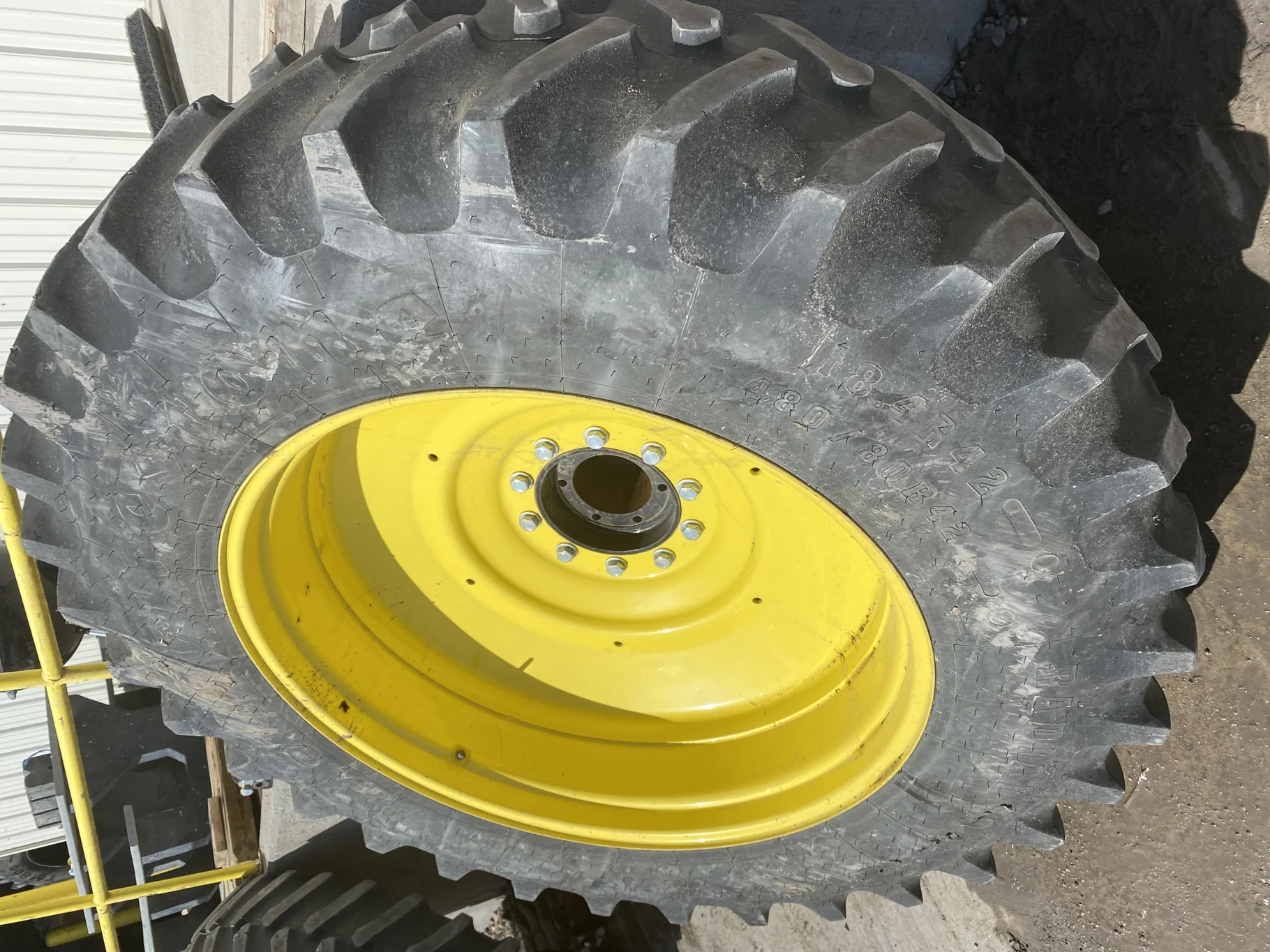 Used 65% 480/80R42 Firestone RadialAll Traction R-1W (151B) TL on a 16 x 42 JD Yellow 10 Bolt image 2
