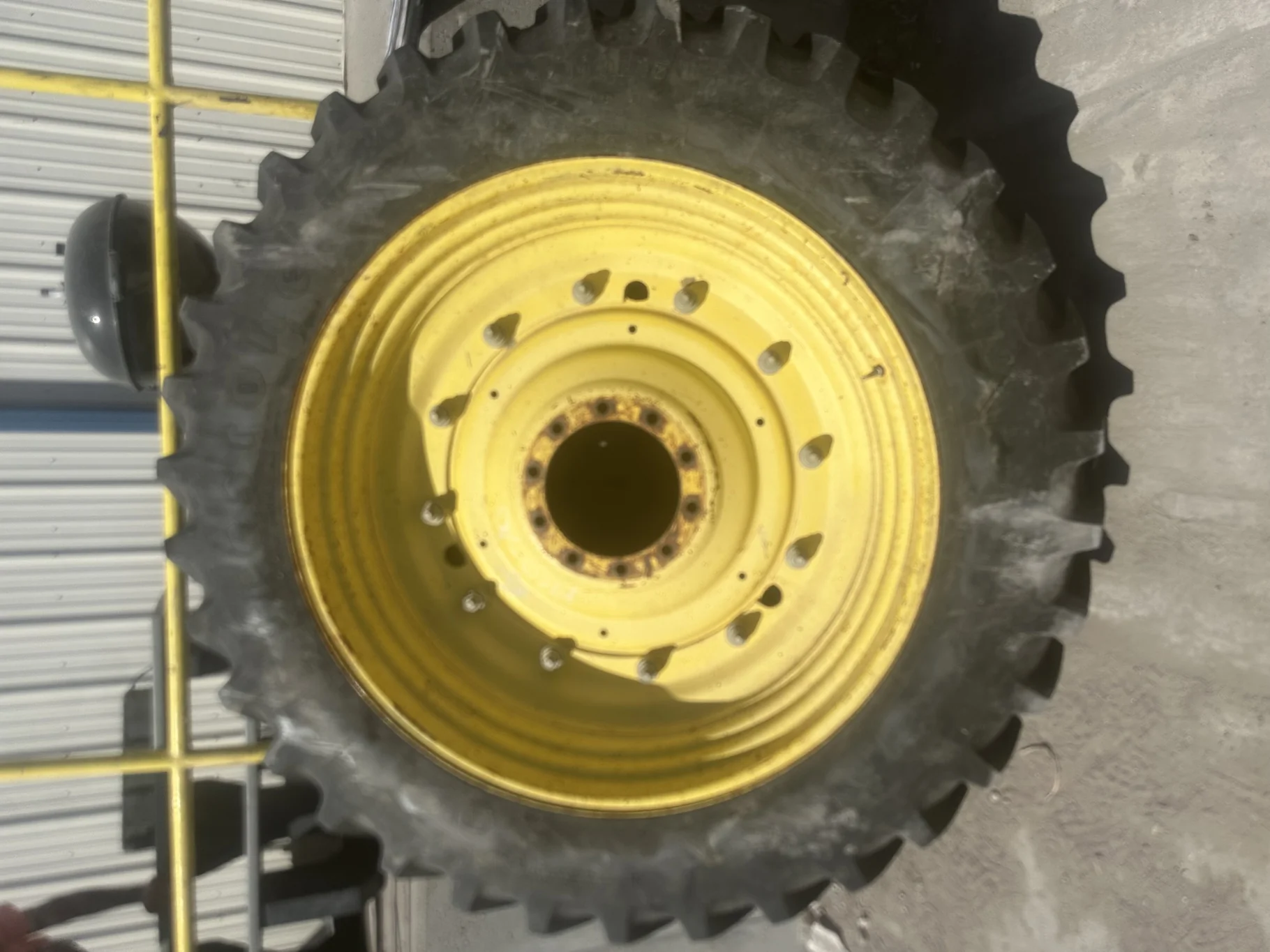 Used 40% 420/85R34 Firestone Radial All Traction Deep Tread R-1W (147B) TL on a 15 x 34 JD Yel image 2