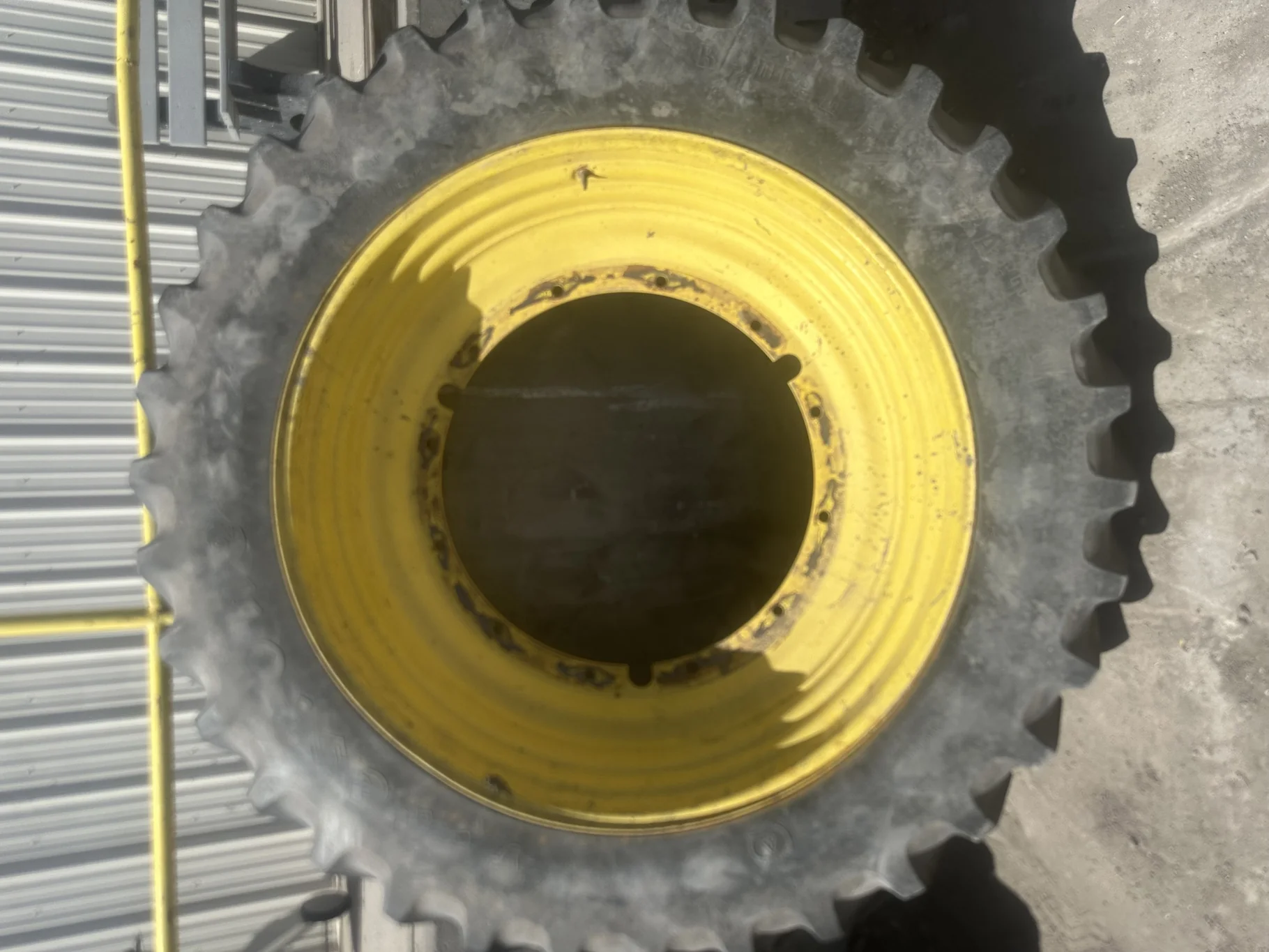 Used 40% 14.9R46 Firestone Radial All Traction 23 R-1 (145B) TL on a 13 x 46 JD Yellow 12 Bol image 2