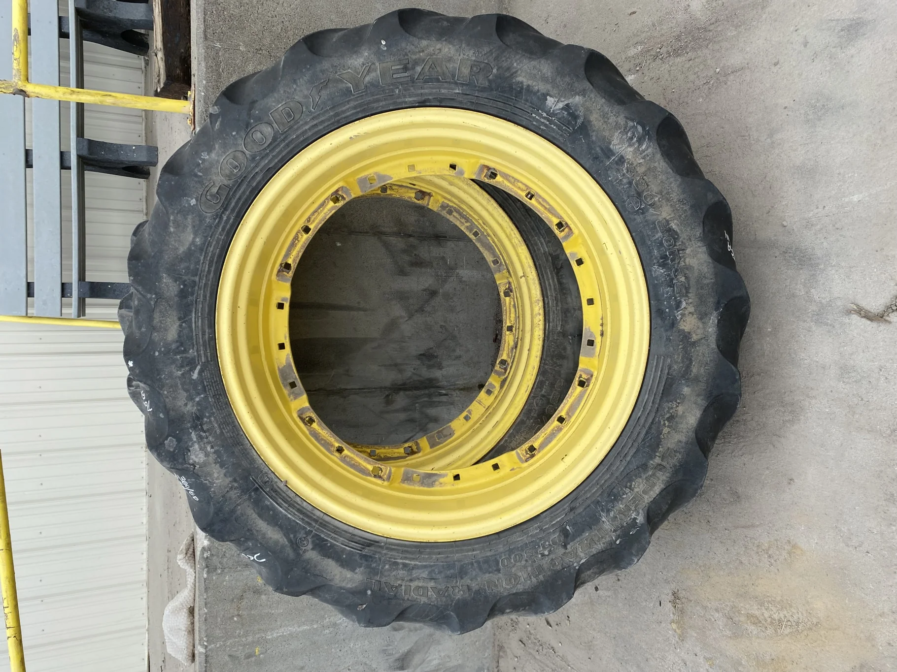 Used 35% 380/80R38 Goodyear Optitrac (142D) R-1W TL on a 12 x 38 John Deere Yellow 12 Bolt Waffle Wh