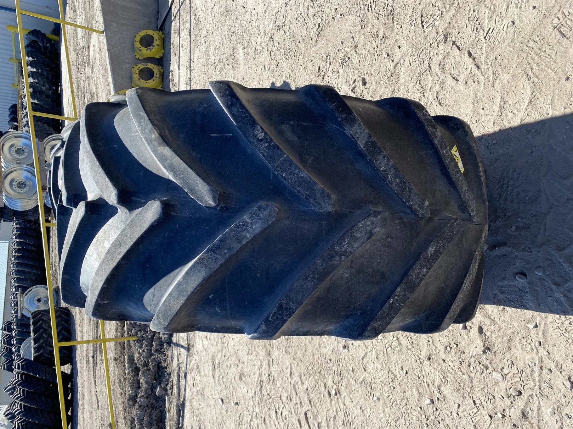 Used 67% 600/65R28 Michelin XM28 TL on a 18 x 28 JD Yellow Waffle Wheel (3 Bolt) 4" offset   ( image 4