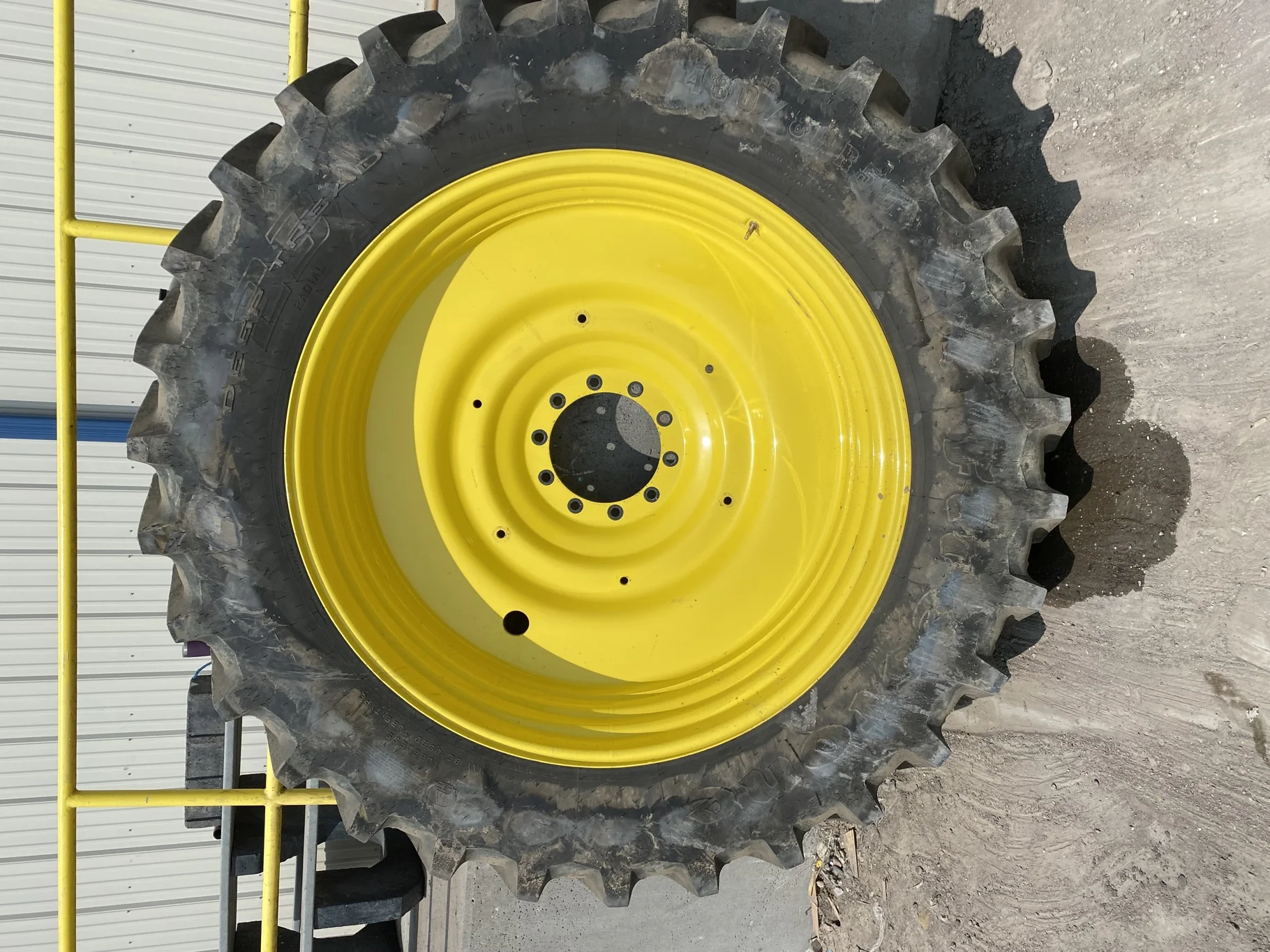 Used 90 480/80R50 Firestone Radial Deep Tread 23 R-1W (159B) TL on a 15 x 50 JD Yellow 10 Bol image 2