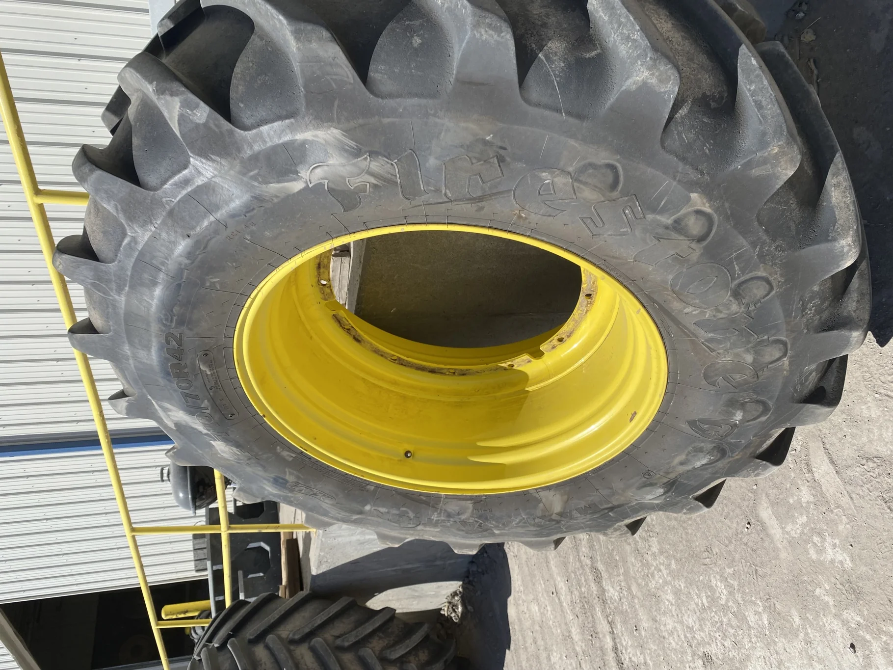 Used 93% IF710/70R42 Firestone Maxi Traction R-1W (179D) TL on a 23 x 42 JD Yellow 12 Bolt (.9 image 3