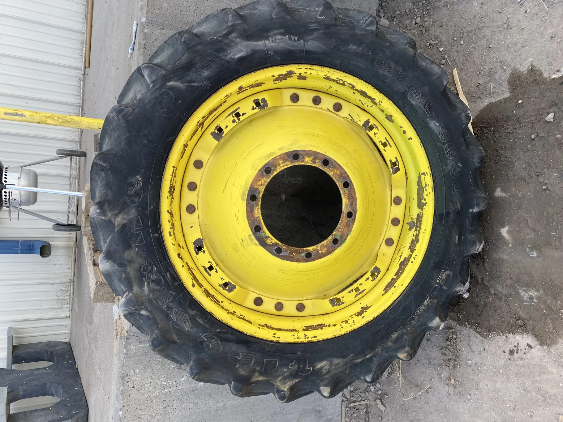 Used 50% 320/85R34 Firestone Radial 9000 R-1W (133B) TL on a 10 x 34 John Deere Yellow 10 Bolt (.9 image 2