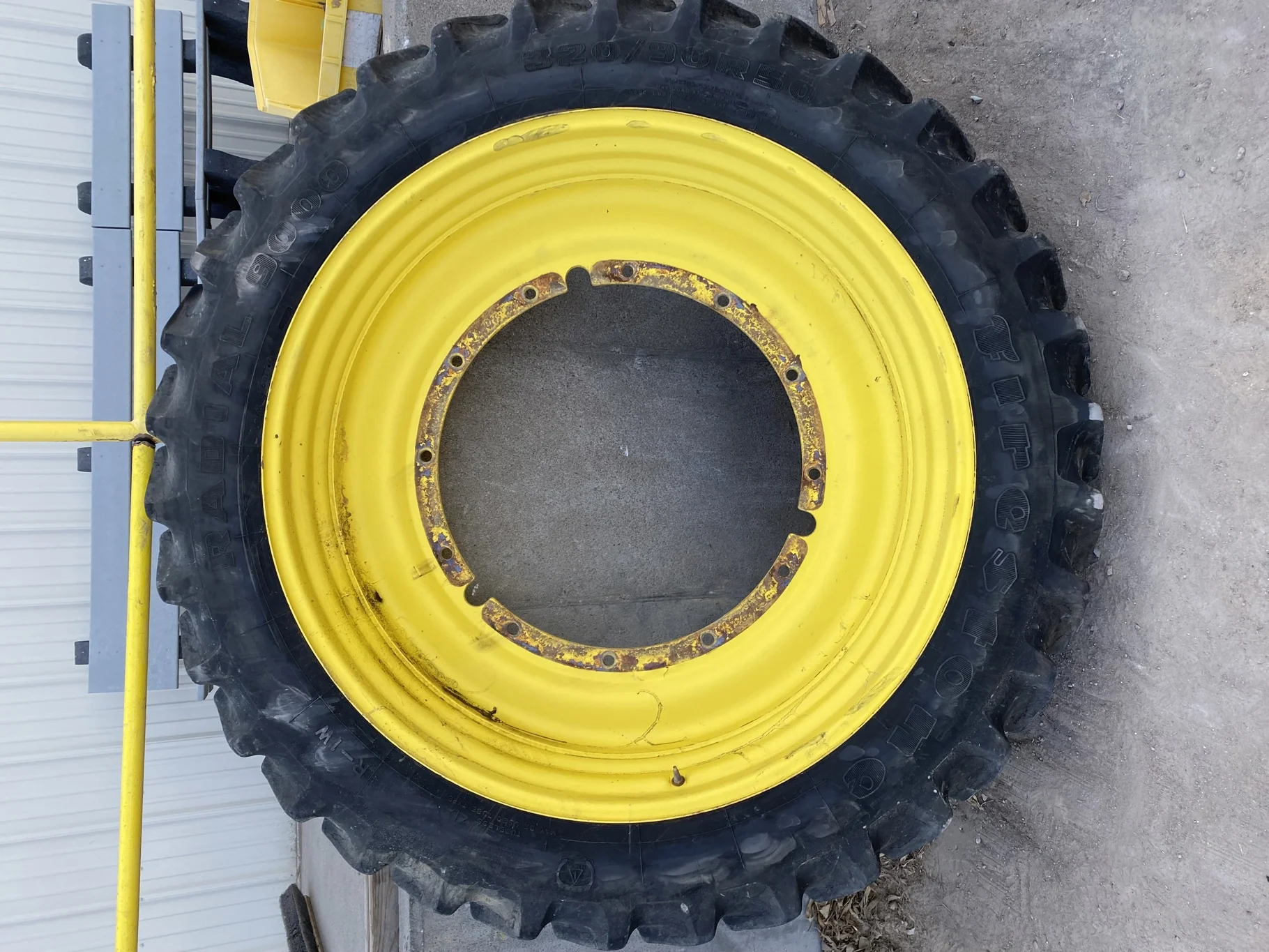 Used 65% 320/90R50 Firestone Radial 9000 R-1W (148B) TL on a 10 x 50 John Deere Yellow 12 Bolt Stub image 2
