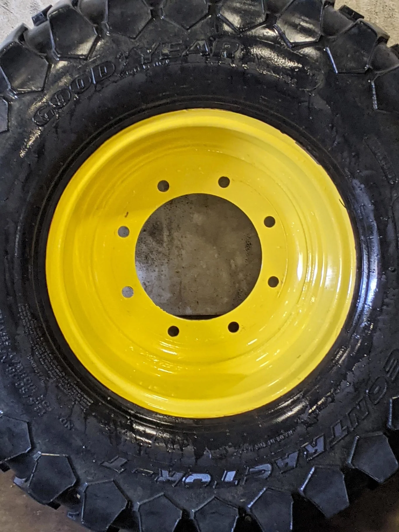 Used 55% 12.5/80-18 Goodyear Contractor T R-4 tire C(6Ply) on a 9 x 18 JD Yellow Straight Plat image 2