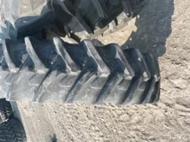 Used 55% 320/85R38 Michelin AgriBib Row Crop (143A8) on a 10 x 38 John Deere Yellow Stub Disc (weath image 2