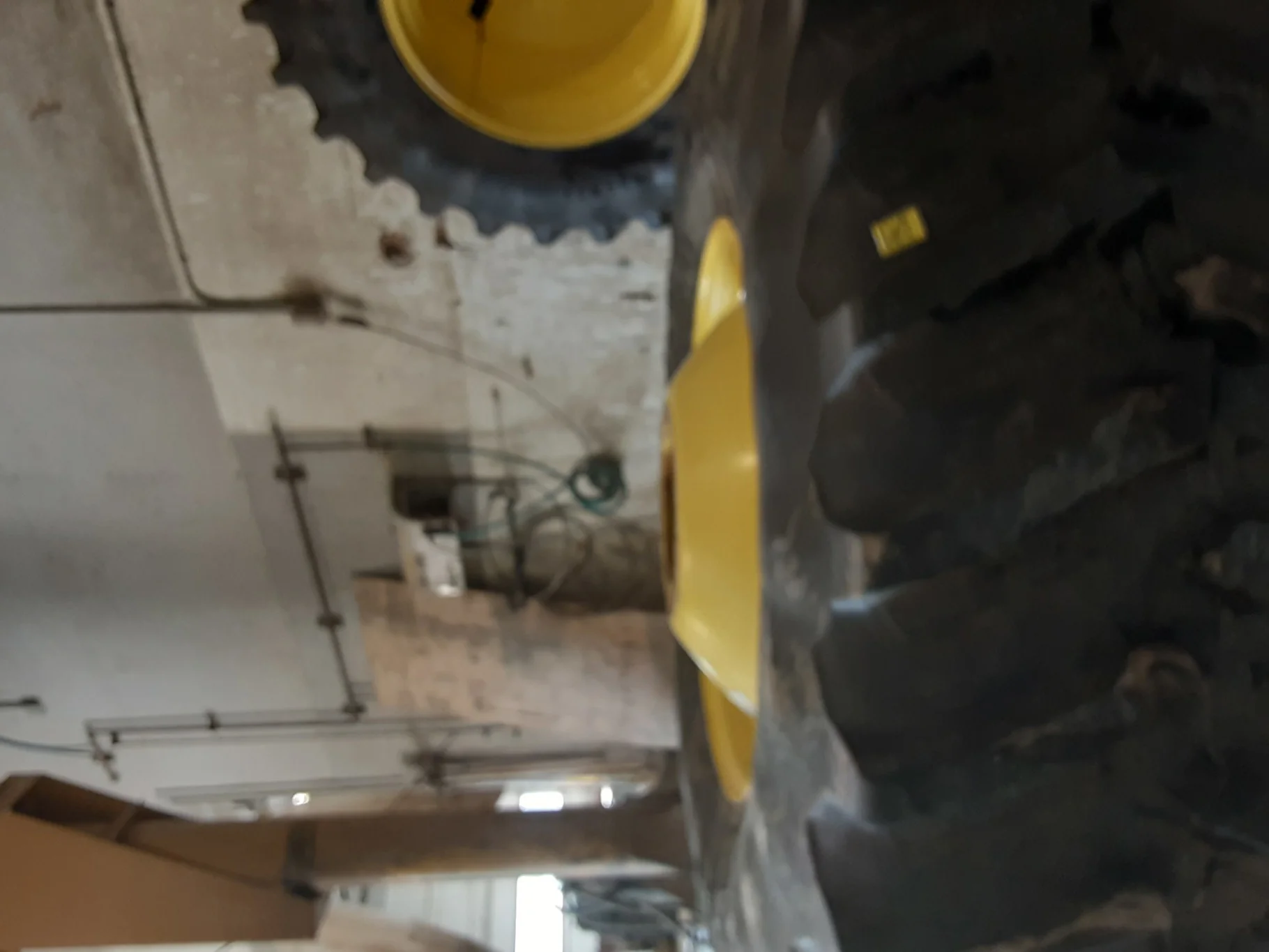 Used 90% 650/85R38 Firestone Radial Deep Tread 23 R-1W (173B) on 23 x 38 John Deere Yellow image 2