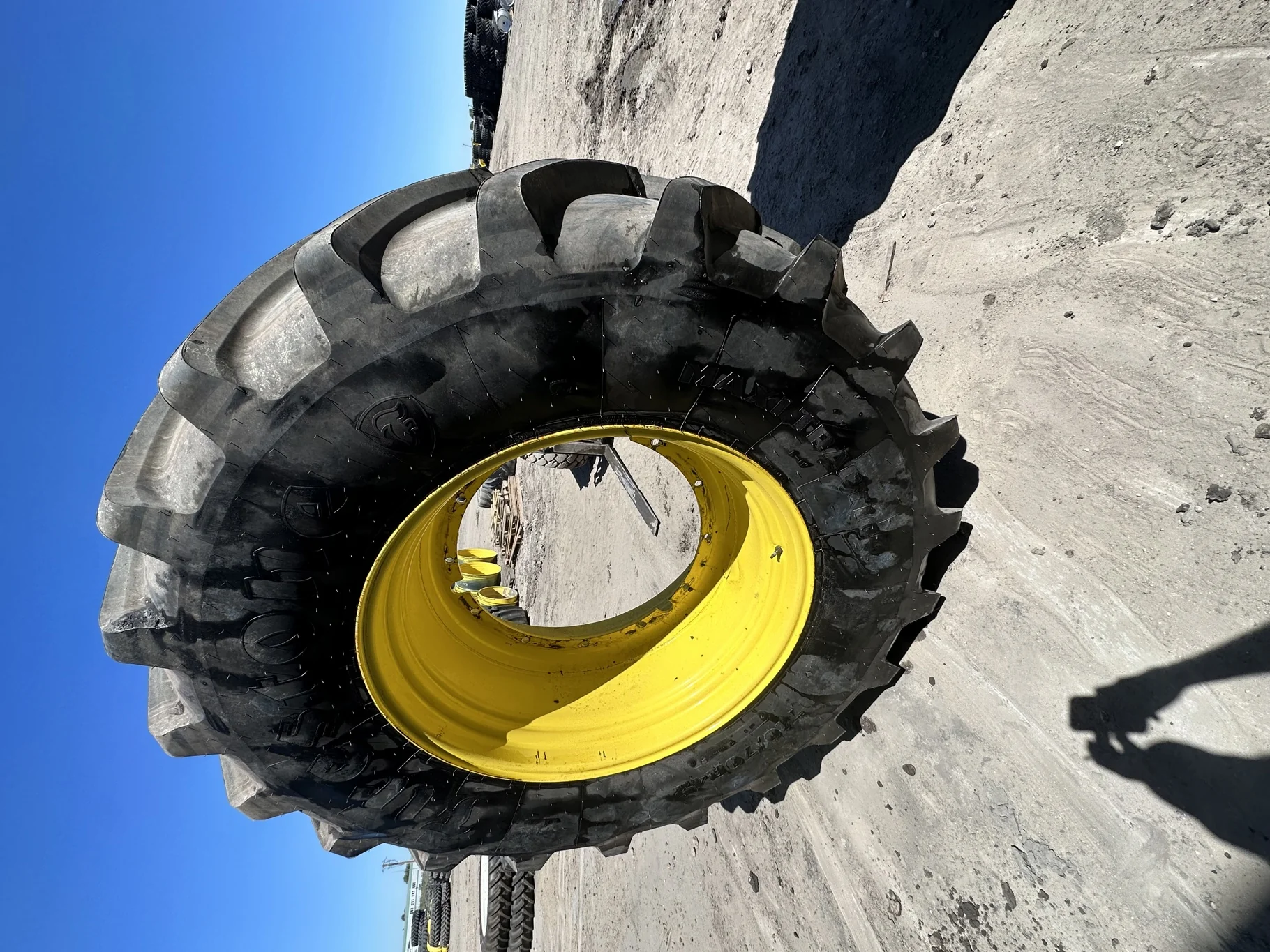 Used 98% 710/70R42 Firestone Maxi Traction R-1W (168D) TL on a 23 x 42 JD Yellow 12 Bolt (.945
