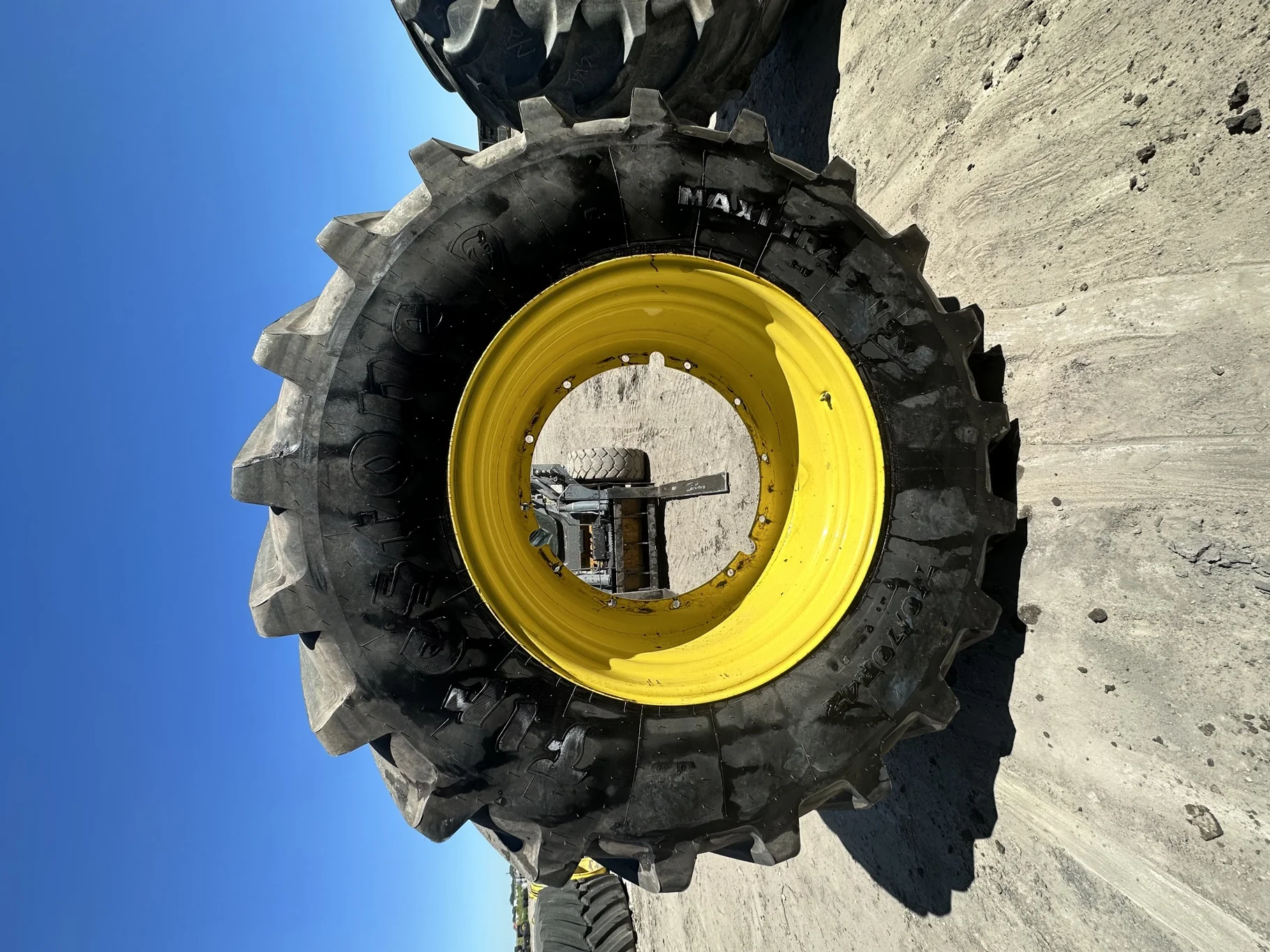 Used 98% 710/70R42 Firestone Maxi Traction R-1W (168D) TL on a 23 x 42 JD Yellow 12 Bolt (.945 image 2