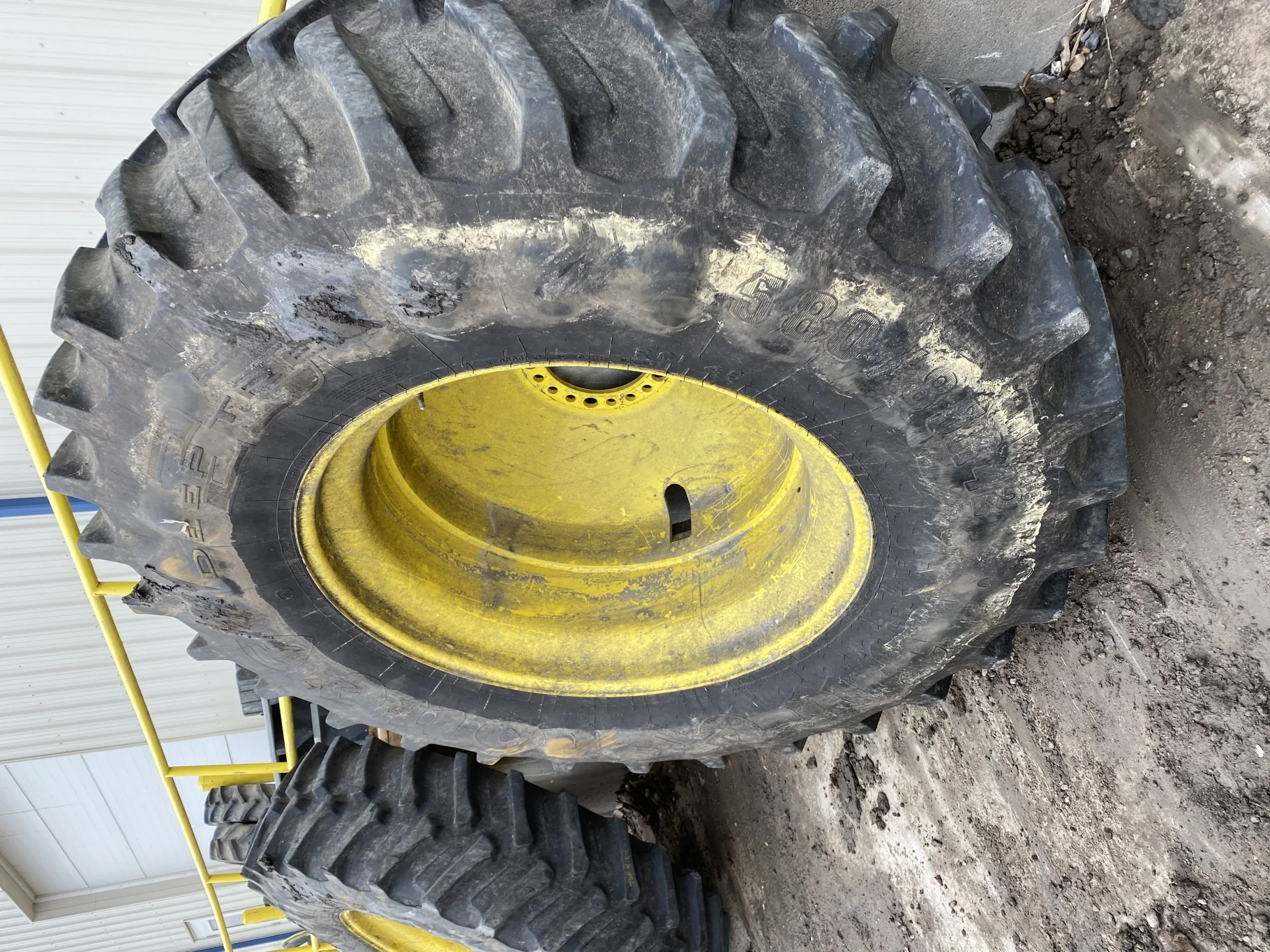 Used 85% 580/85R42 Firestone Radial Deep Tread 23 R-1W (166B) TL on a 18 x 42 20-13.187-10.50 24.5FS