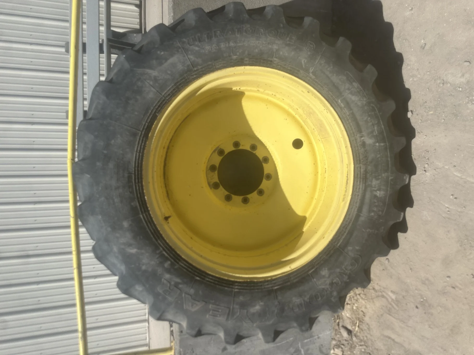 Used 65% 480/80R38 (18.4R38) Goodyear Ultratorque R-1W (144B) TL on a 15 x 38 JD Yellow 10 Bol